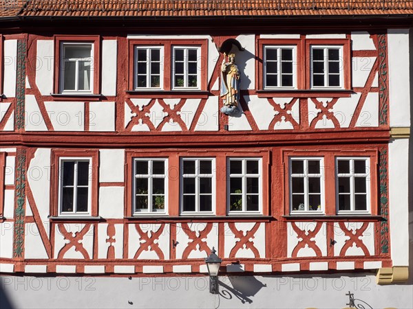 Figure of a saint on a half-timbered house