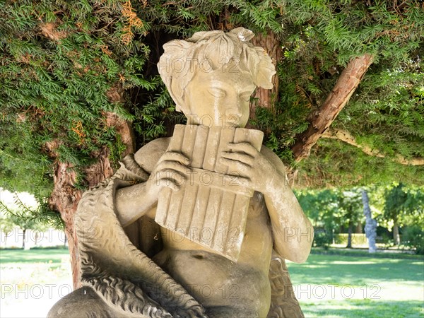 Statue of the shepherd god Pan in the Court Garden