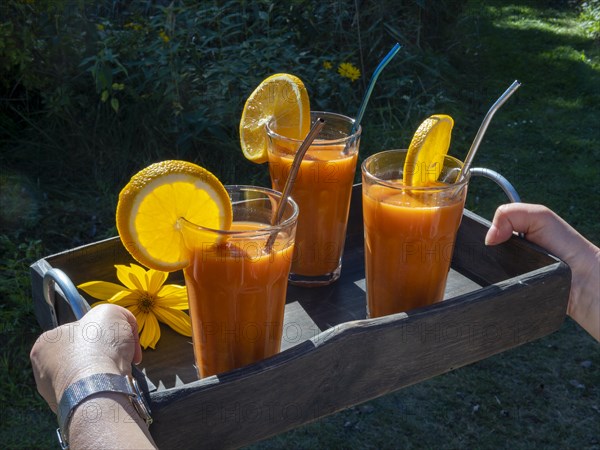 Freshly squeezed juice in juice glasses