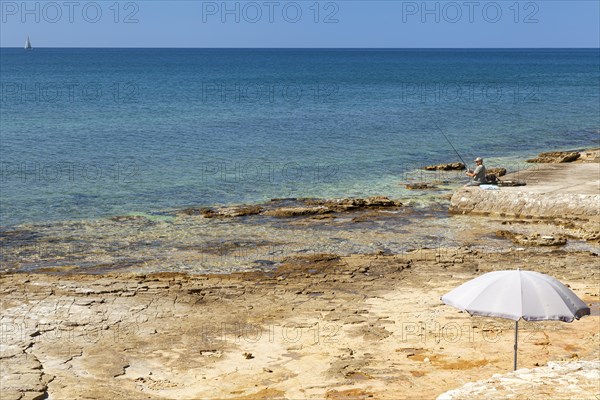 Beach on the stone coast of Beach Kastanija