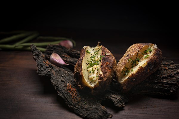 Rustic baked potatoes close up