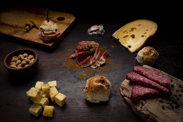 A wooden table with cheese