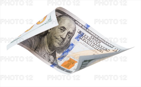 One hundred dollar bill falling or floating on empty background