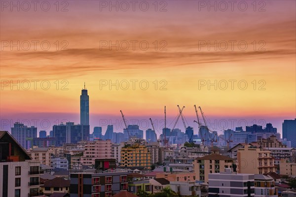 Colorful sunset over big city