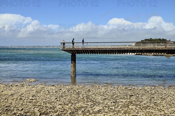 Pier in shallow sea water off Le Croisic