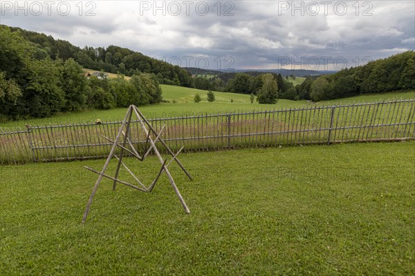 Rainy weather with meadow and farm