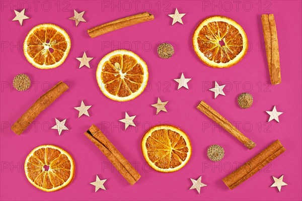 Seasonal flat lay with natural dried orange slices