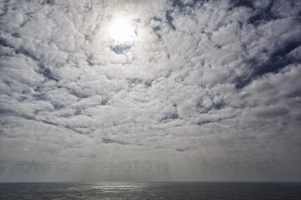 Sunbeams through cloud cover