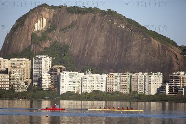 Rowing boat in the evening light in the lagoon Lagoa Rodrigo de Freitas