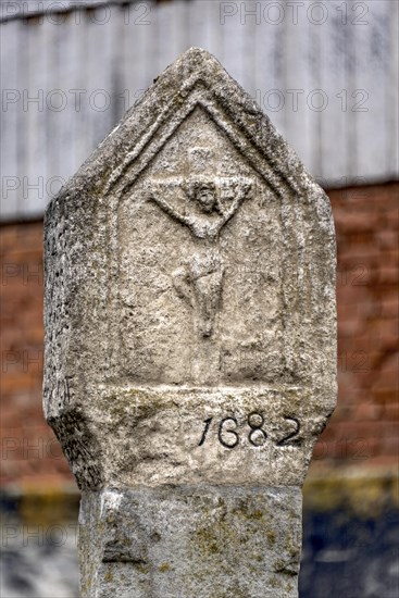 Stone wayside shrine