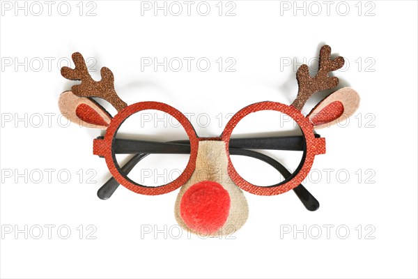 Funny Christmas reindeer eyeglasses on white background