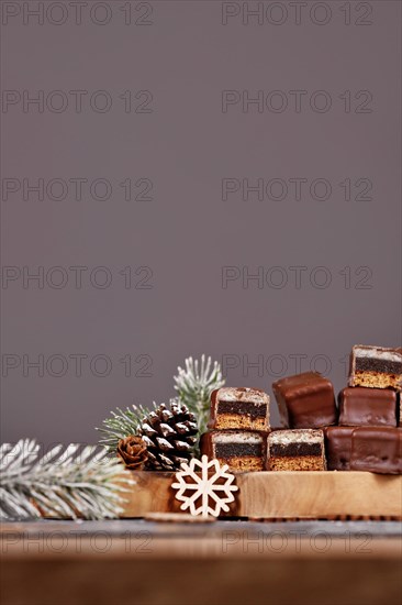 Halved traditional German sweets called 'Dominosteine'. Christmas candy consisting of gingerbread