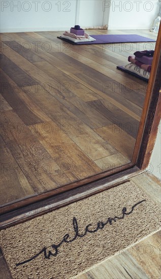 Welcome coir doormat outside a Yoga Studio