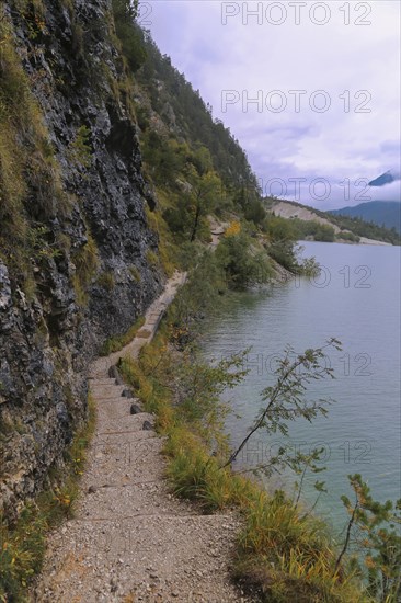 Hiking trail at the Achensee and view to the Achensee boat trip