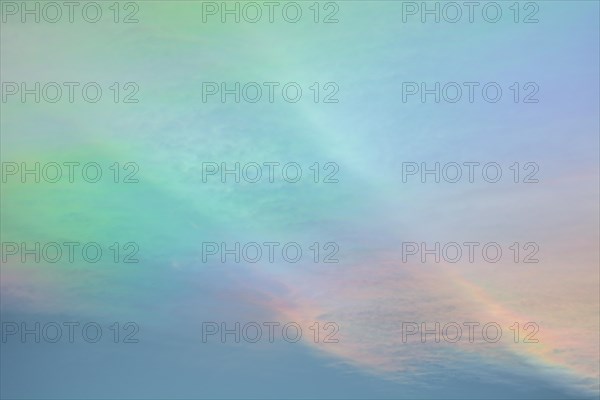 Quite rare optical phenomenon of iridescence of clouds of pearly