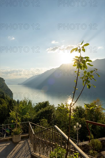 The Historical Grandhotel Giessbach with View over Mountain and Lake Brienz with Sunlight in Giessbach