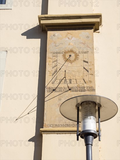 Sundial on a house facade