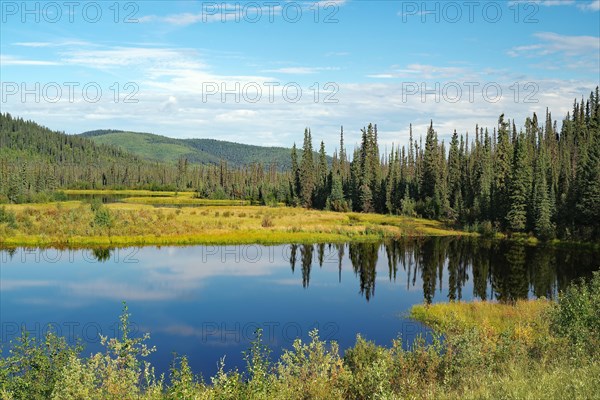 Clouds reflected in a crystal clear