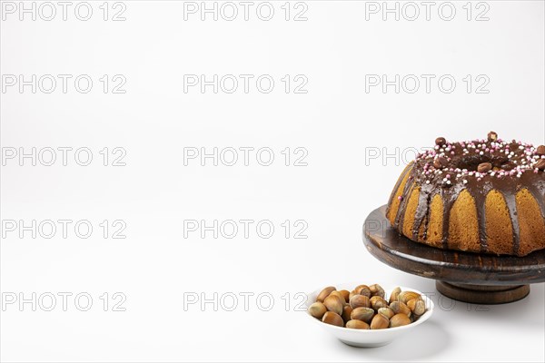 Vegan hazelnut cake on wooden serving plate