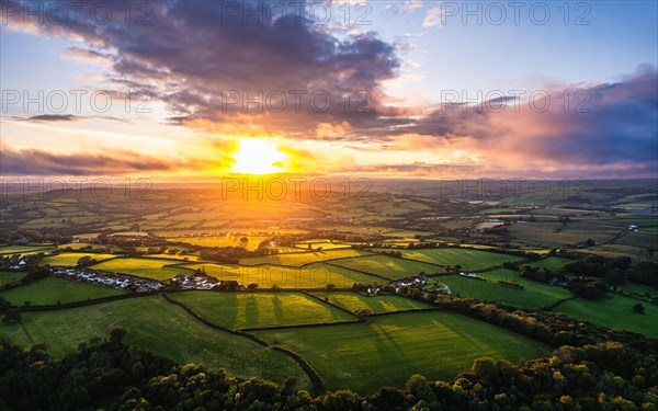 Sunset over Fields and Farms from a drone