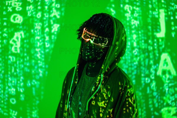 Futuristic portrait of a man with Artificial intelligence glasses with green neon lights