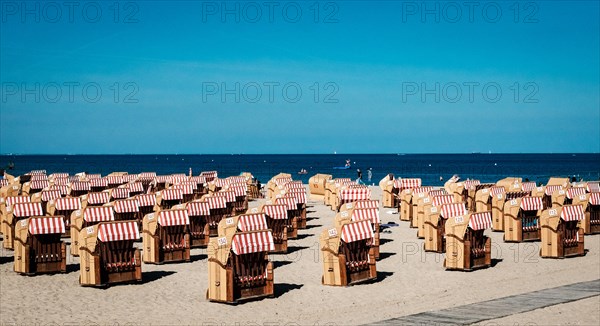 Beach chairs on the Baltic Sea beach in Travemuende. Schleswig-Holstein