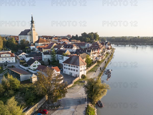 Riverbank promenade and town aerial view