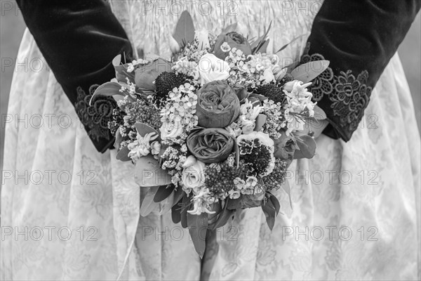 Bridal bouquet with traditional Zillertal traditional costume