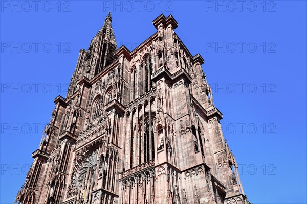 Tower of famous Strasbourg Cathedral in France in romanesque and gothic architecture style