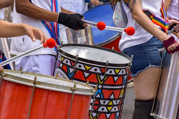 Samba and carnival in the streets of Brazil with people and their musical instruments