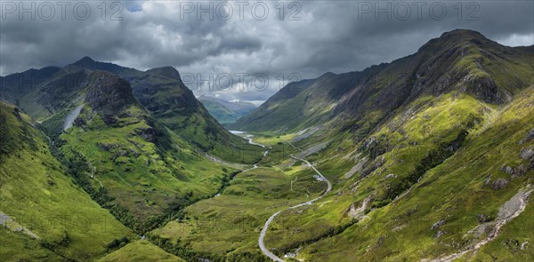 Aerial panorama of Glen Coe with the A82 scenic road