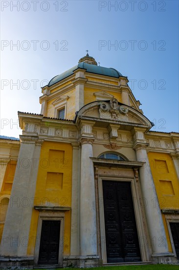Temple of the Holy Cross Against Blue Clear Sky in a Sunny Day in Riva San Vitale