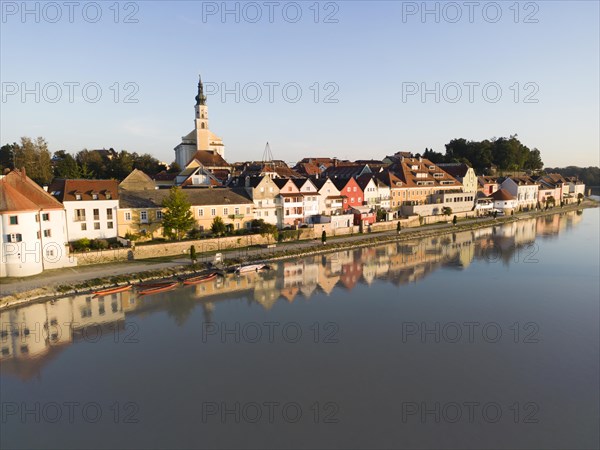 Riverbank promenade and town aerial view