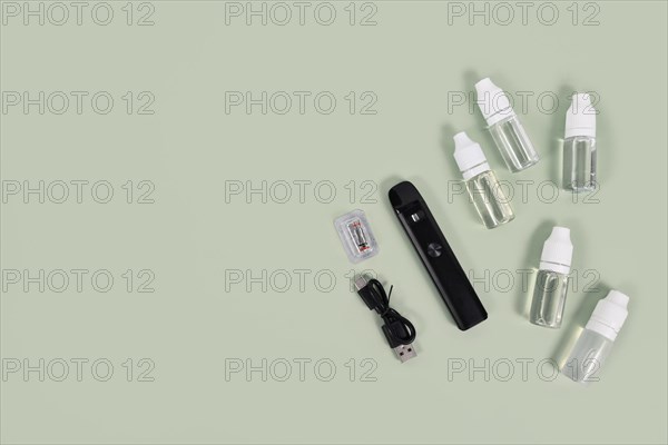 Bottles with liquid solutions for electronic cigarettes with tools