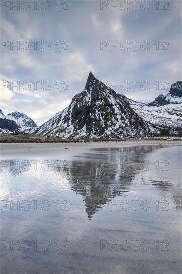 Mount Hatten reflected on the beach