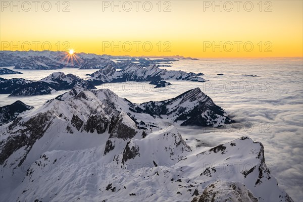 View from the Saentis to the mountains of Central Switzerland at sunset