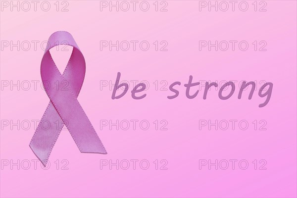 Be strong motivational inscription. National Breast Cancer Awareness Month concept
