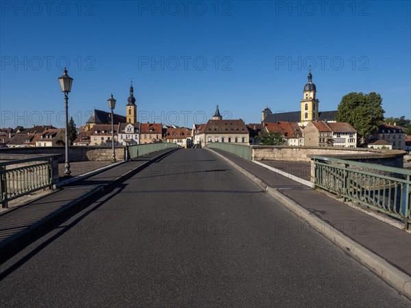 View of townscape on the Main with St. Johannes Church and historic Old Main Bridge