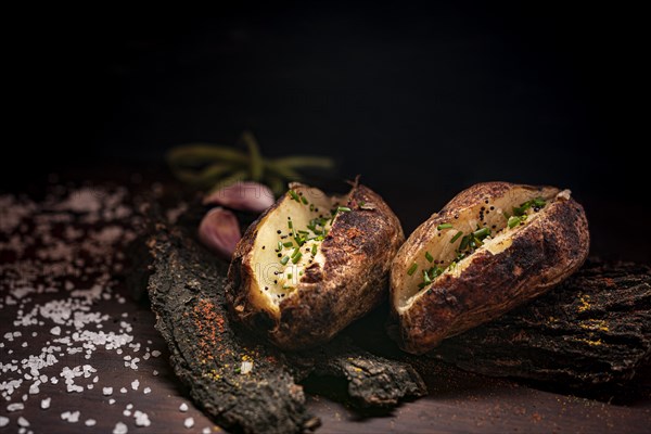 Rustic baked potatoes close up