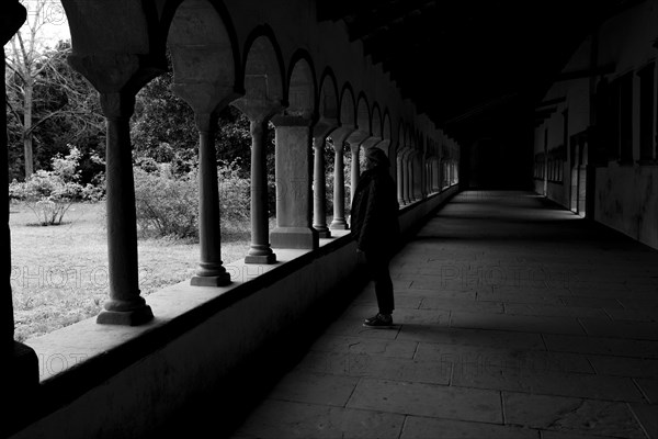 Woman in Silhouette Standing in Front of an Archway in Schaffhausen