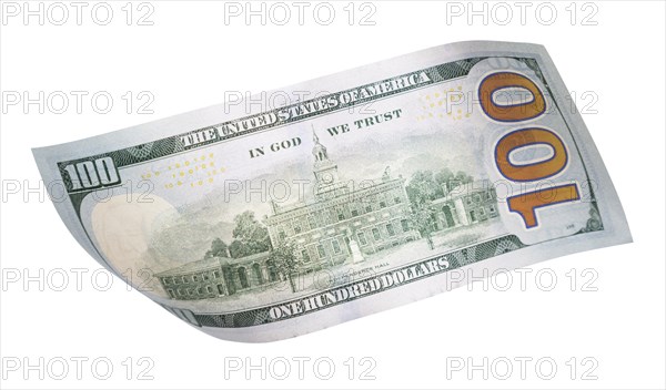 One hundred dollar bill falling or floating on empty background