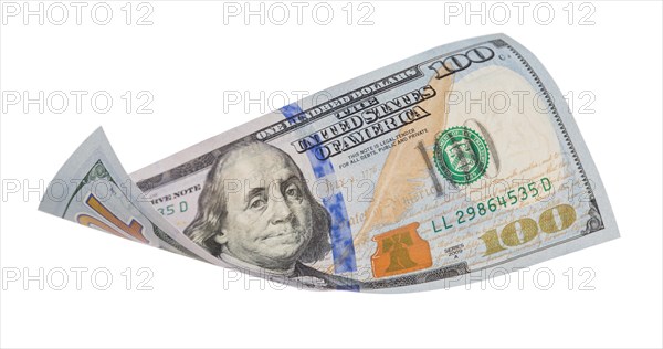 One hundred dollar bill falling or floating on empty background