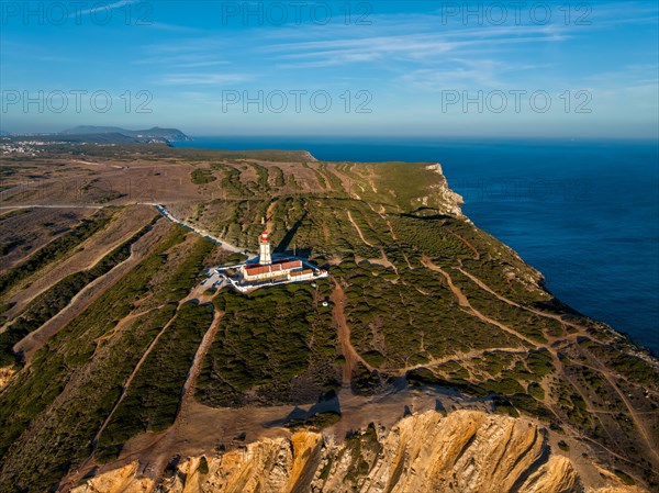 Aerial drone view of lighthouse on Cabo Espichel cape Espichel on Atlantic ocean