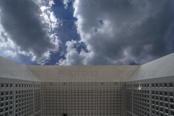 Cloudy sky and underside of the roof of the Grand Arche