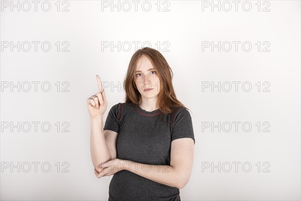 Portrait of a young red haired woman