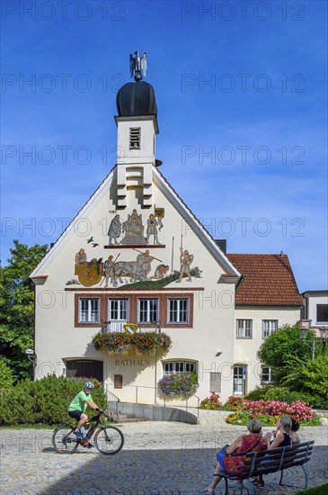 The town hall with cyclist