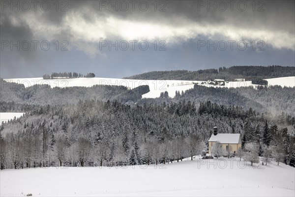 Fresh snow in November with a view of the Ohmen Chapel