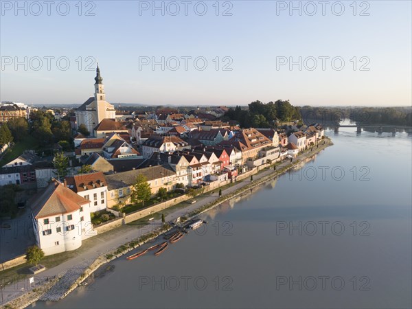 Riverbank promenade and town aerial view