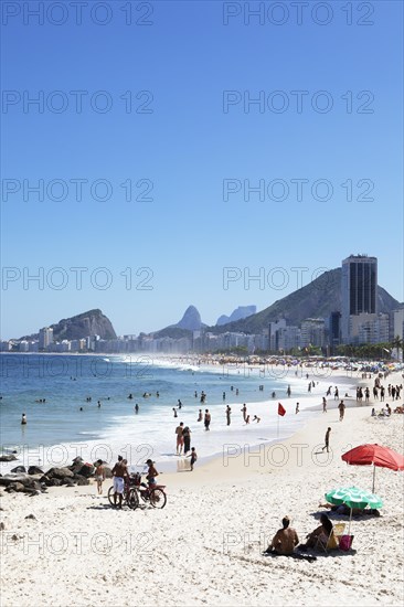 Copacabana beach with the mountains in the background