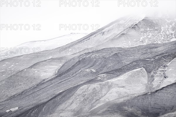 Fresh snow on mountain slopes